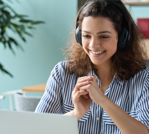 Engaged person watches presentation on laptop