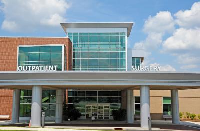 Pictured: A hospital entrance reading Outpatient and Surgery