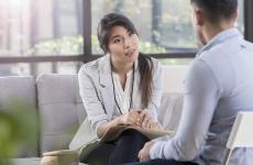 Therapist talking with client