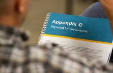 Pictured: A close photo of the AMSR spiral-bound manual