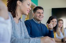 Educators sitting at table