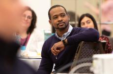 Healthcare professional listening during meeting
