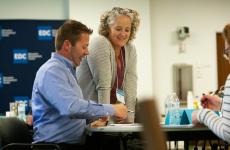 Trainer speaks with training participant