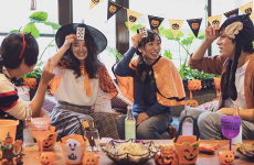 Youth play a party game during Halloween