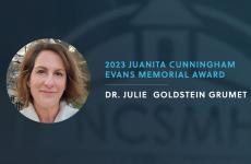 Headshot of Julie Goldstein receiving award