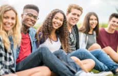 Smiling teens looking at the camera