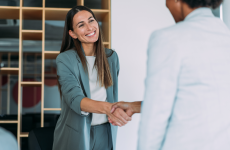 Two professionals shaking hands