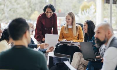 Group of teachers working around a table