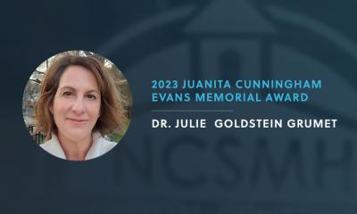 Headshot of Julie Goldstein receiving award