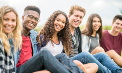 Smiling teens looking at the camera