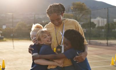 Photo of a coach and students