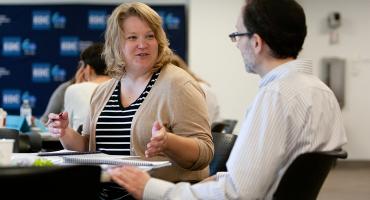 Healthcare professionals talking at a training