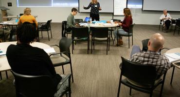 Trainer leading training