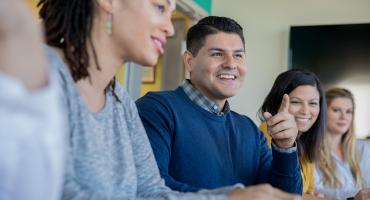 Educators sitting at table