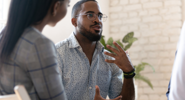 Person leading meeting