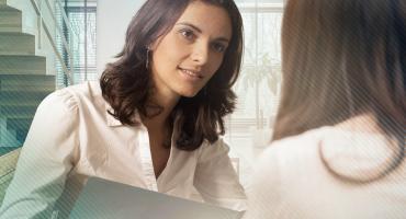 Mental health professional speaks to client