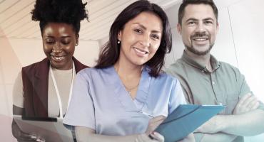 A trio of mental health professionals smile at the camera