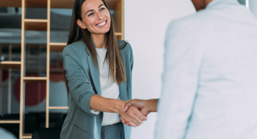 Two professionals shaking hands