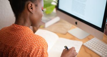 Woman writes a grant