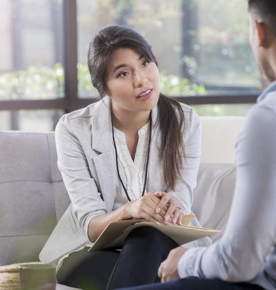 Therapist talking with client