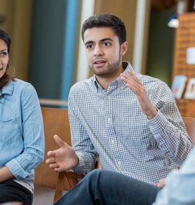 Therapist talking with clients