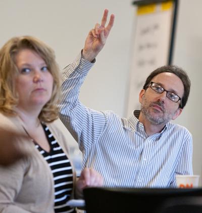 Healthcare professional listening during meeting