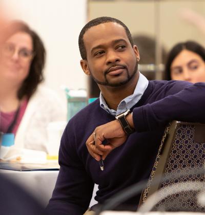 Healthcare professional listening during meeting