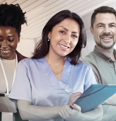 A trio of mental health professionals smile at the camera
