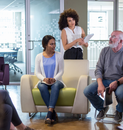 People in an office discussing