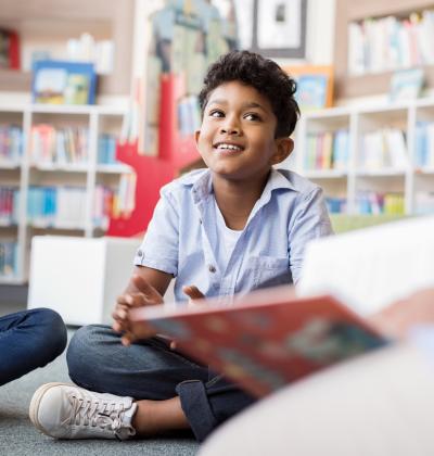 Children reading in a library