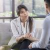 Therapist talking with client