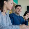 Educators sitting at table