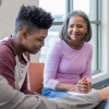 Professional smiling at youth