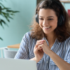 Engaged person watches presentation on laptop