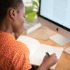 Woman writes a grant